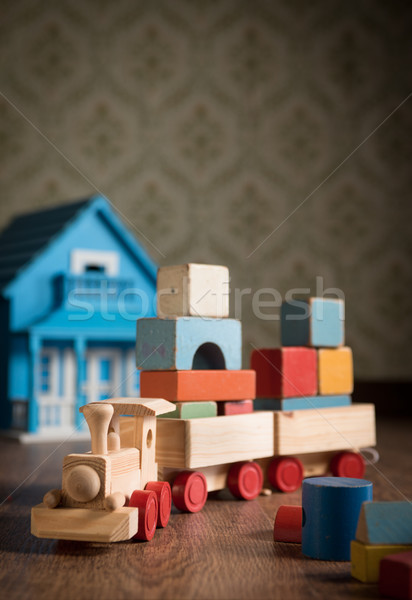 Wooden toy train and doll house Stock photo © stokkete