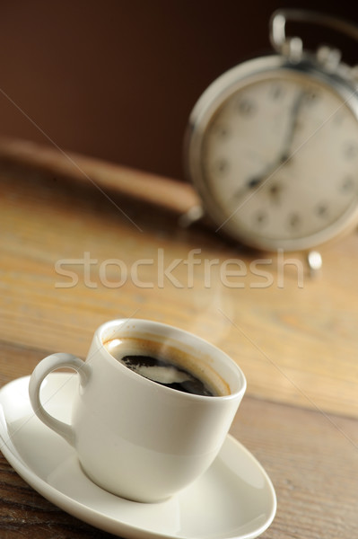 Alarm clock and coffee cup  Stock photo © stokkete