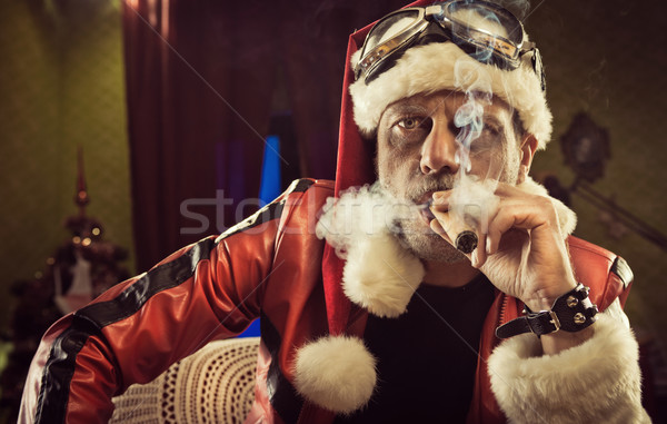 Bad Santa smoking a cigar Stock photo © stokkete