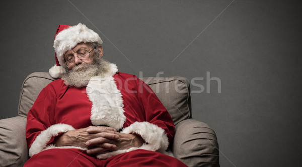 Papá noel sillón soñoliento toma siesta relajante Foto stock © stokkete