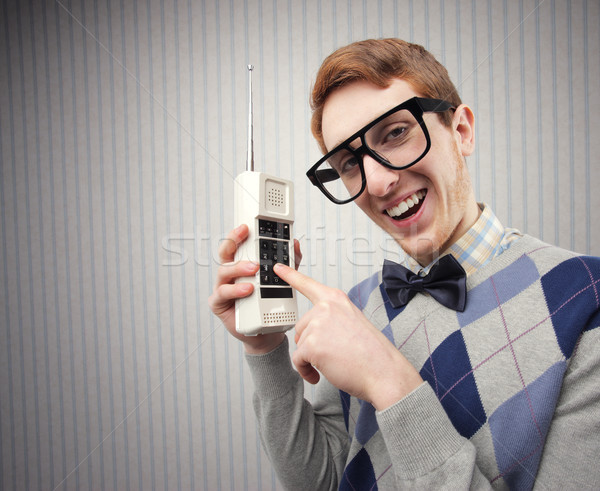 Nerd student oude mobiele telefoon bril vintage Stockfoto © stokkete