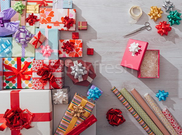 Wrapping Christmas gifts Stock photo © stokkete