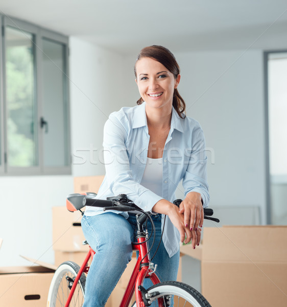 Woman moving with her bicycle Stock photo © stokkete