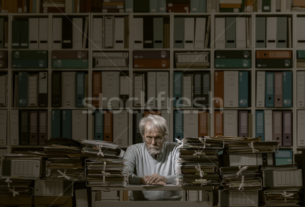Office worker overloaded at work Stock photo © stokkete