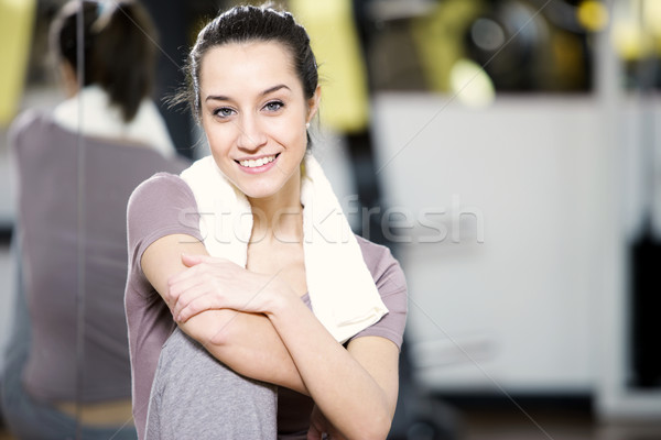 fitness portrait: A young female stays fit. Stock photo © stokkete