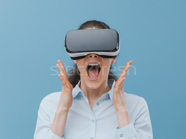 Woman experiencing virtual reality Stock photo © stokkete