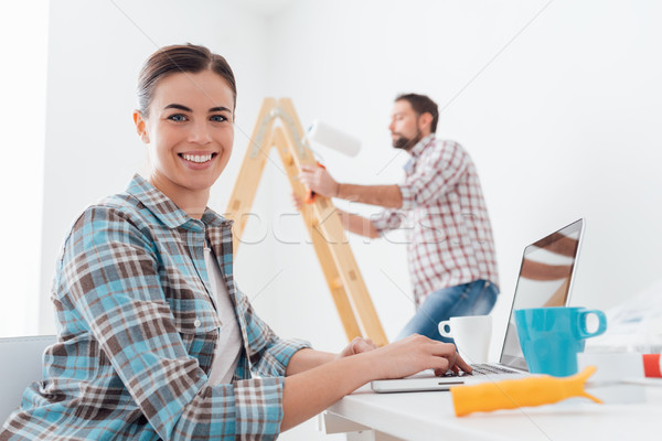 Happy couple remodeling their house Stock photo © stokkete