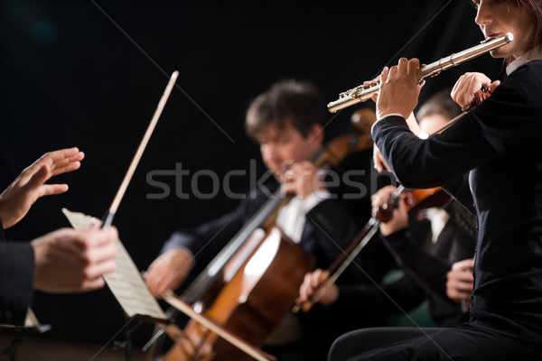 Conductor directing symphony orchestra Stock photo © stokkete