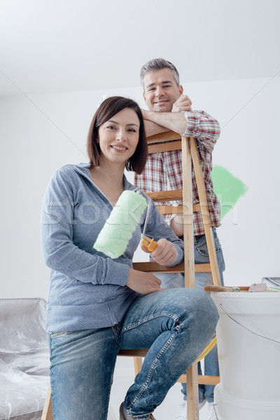 Couple painting their house Stock photo © stokkete
