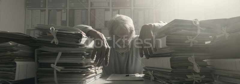 Stressed overloaded office worker Stock photo © stokkete