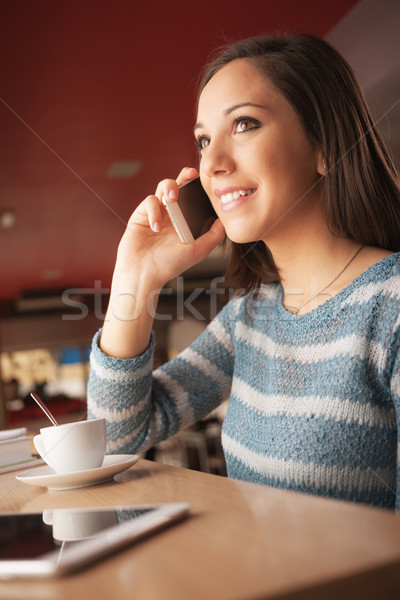 Happy woman having a phone call Stock photo © stokkete