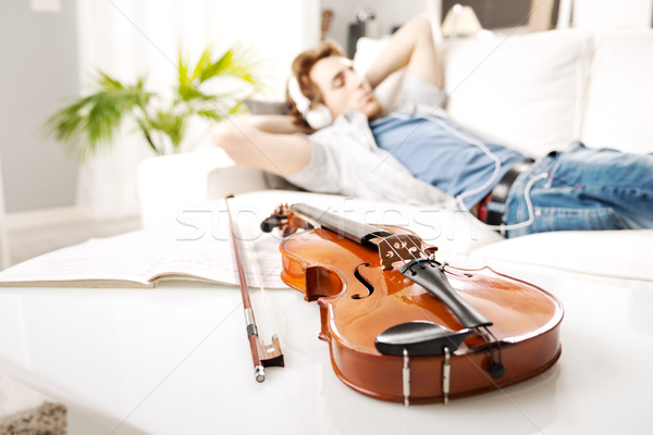 Musician relaxing at home Stock photo © stokkete