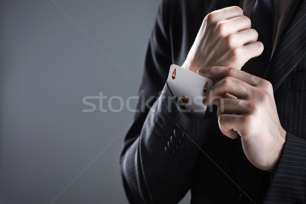 üzletember ász kártya rejtett kabátujj kezek Stock fotó © stokkete