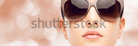 Young fashion model with sunglasses Stock photo © stokkete