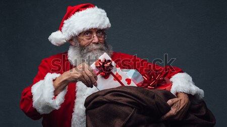 Bad Santa celebrating at home Stock photo © stokkete