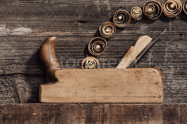 Old wood planer and shavings Stock photo © stokkete