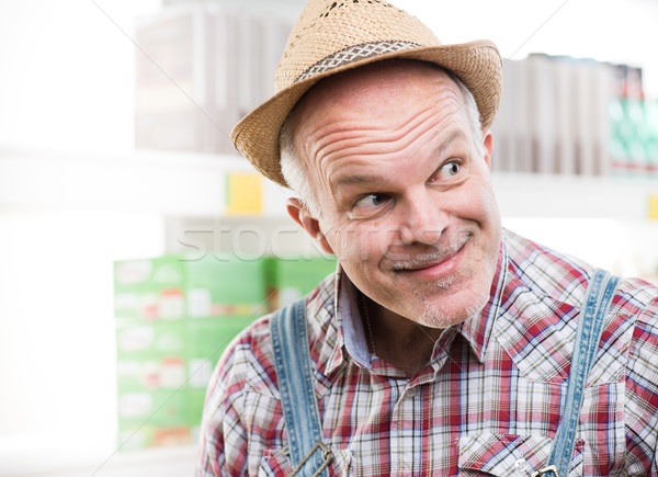 Vicces gazda áruház készít arc néz Stock fotó © stokkete