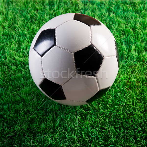 Minge de fotbal artificial verde plastic Imagine de stoc © stokkete