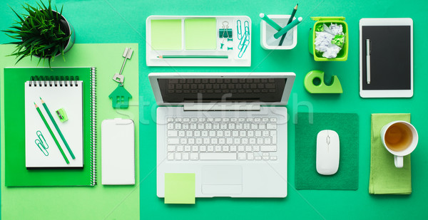 Zöld kreatív asztali laptop iroda kellékek Stock fotó © stokkete