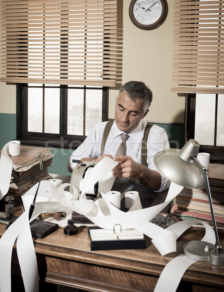 Busy vintage accountant with calculator Stock photo © stokkete