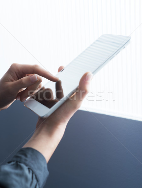 Woman with digital tablet Stock photo © stokkete