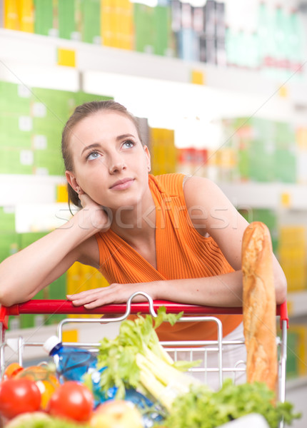 Pensive woman at store Stock photo © stokkete