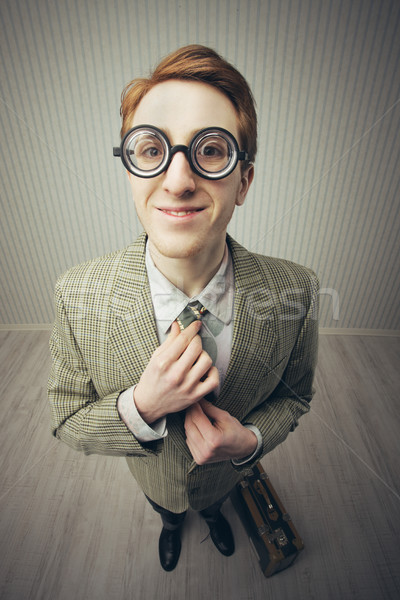 Vanzator zâmbitor cravată vechi stil ochelari Imagine de stoc © stokkete