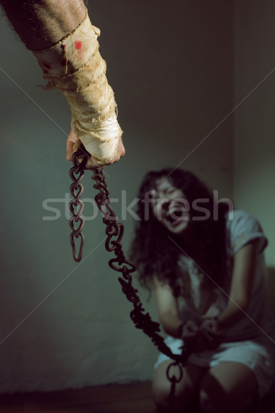 Młoda kobieta łańcuchy niewolnik kobieta więzień zło Zdjęcia stock © stokkete