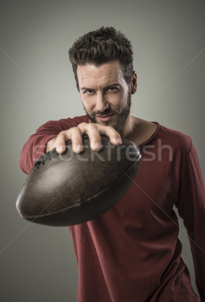 Attractive young fotball player Stock photo © stokkete