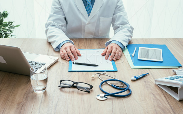 Stock photo: Doctor working at office desk
