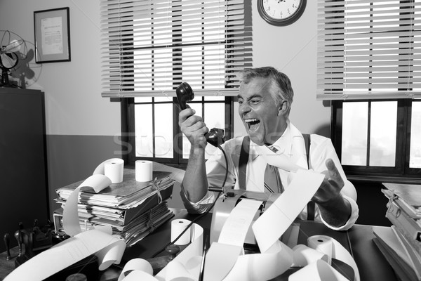 Angry vintage businessman shouting at phone Stock photo © stokkete