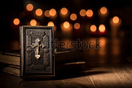 Antique precious Bible and Holy rosary in the Church Stock photo © stokkete