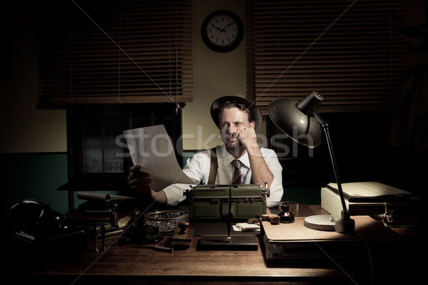 Stock photo: Professional reporter proofreading his text