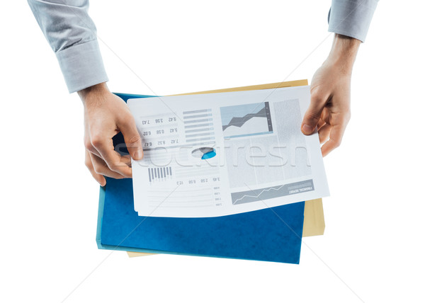 üzletember pénzügyi beszámoló üzletember olvas táblázatok grafikonok Stock fotó © stokkete