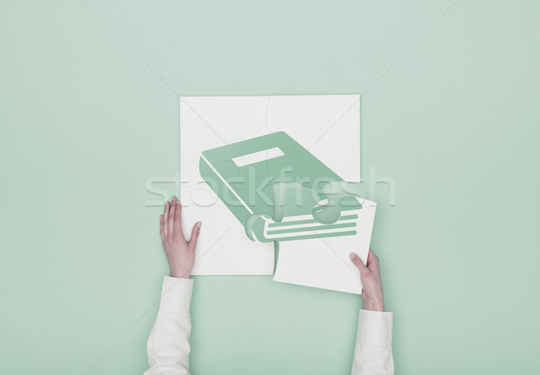 Woman completing a puzzle with book icon Stock photo © stokkete