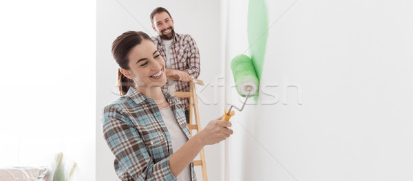 Couple renovating their new house Stock photo © stokkete