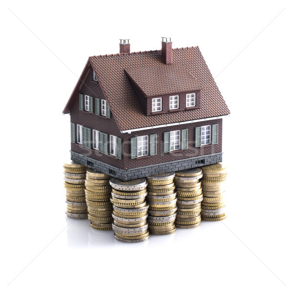 Modelo casa moedas numerário investimentos Foto stock © stokkete