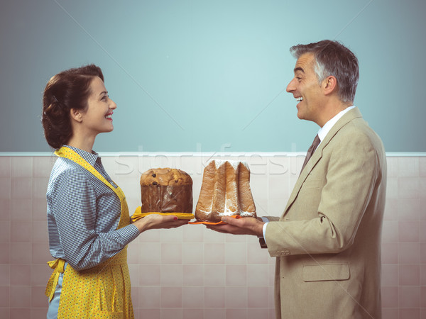 Smiling vintage couple with cakes Stock photo © stokkete