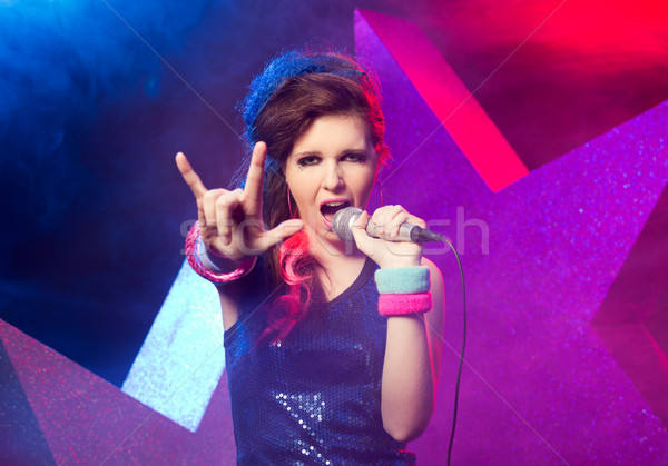Fiatal rocksztár előad gyönyörű lány énekel színpad Stock fotó © stokkete
