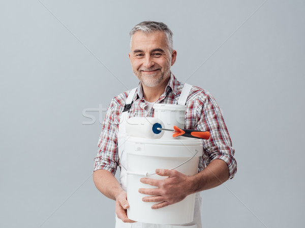 Painter posing with work tools Stock photo © stokkete