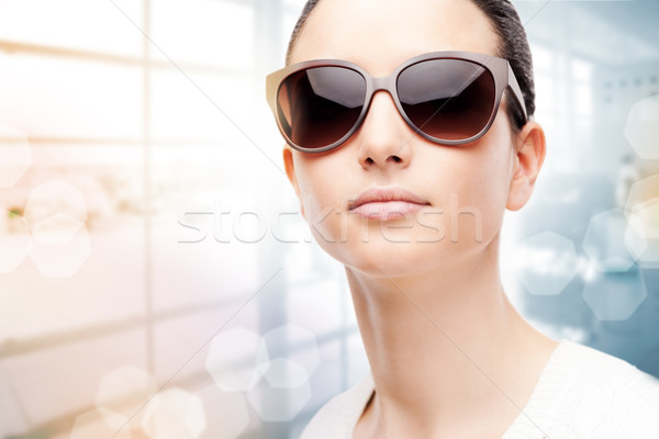 Young fashion model with sunglasses Stock photo © stokkete
