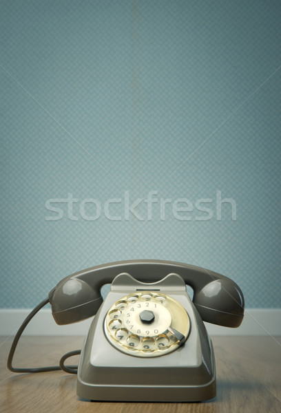 Gray vintage phone on the floor Stock photo © stokkete