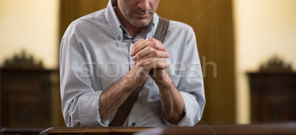 Man praying in the Church Stock photo © stokkete