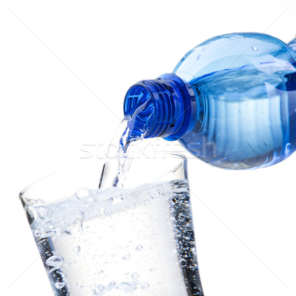 áramló édesvíz üveg friss ásványvíz üveg Stock fotó © stokkete