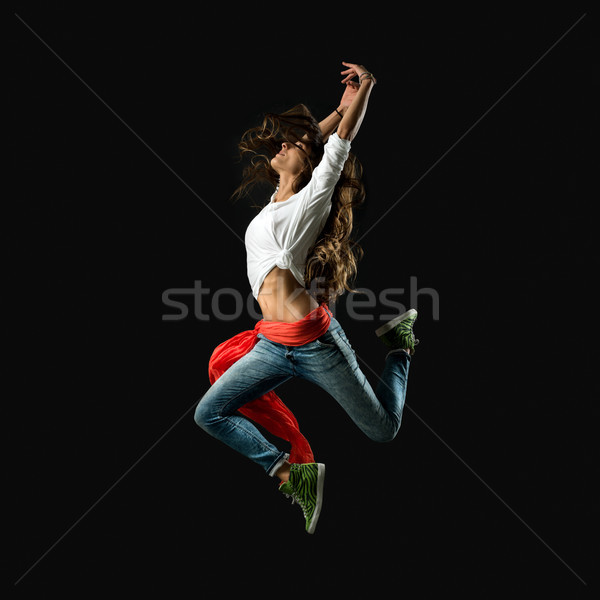 Performer dancing on dark background Stock photo © stokkete