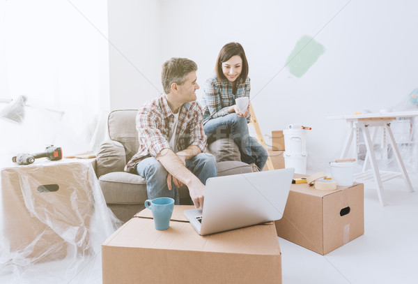 Stock photo: Couple moving into their new house