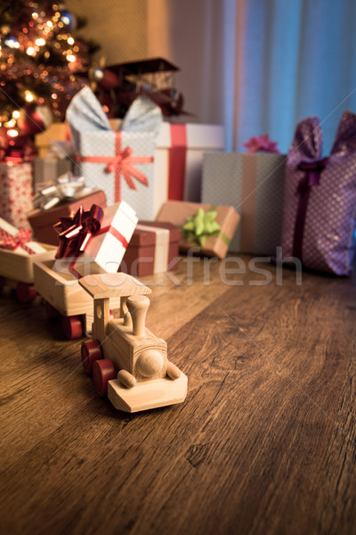 Wooden train with christmas gift Stock photo © stokkete