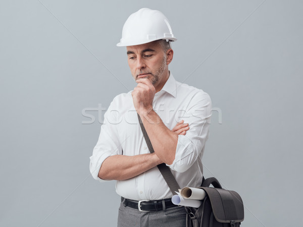 Thoughtful construction engineer Stock photo © stokkete