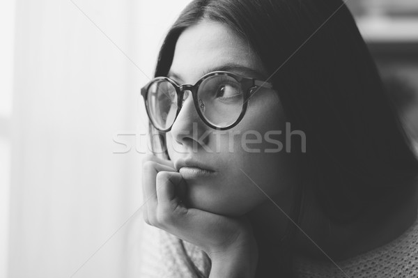 Sad woman day dreaming Stock photo © stokkete