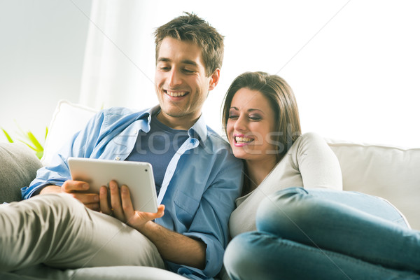 Couple watching movie on tablet Stock photo © stokkete